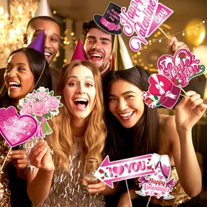 Valentine's Day party photo booth props set with heart shapes and fun paper cutout signs
