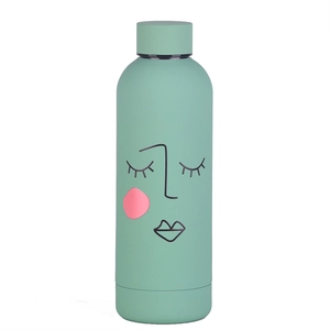 Detail of mint green stainless steel water bottle with abstract black line art face