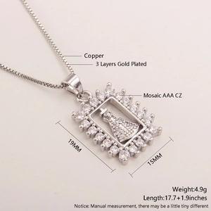 Macro view of 18k gold plated Virgin Mary pendant with AAA cubic zirconia settings