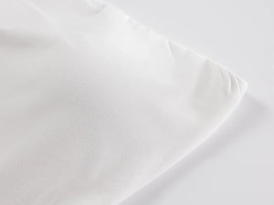 Detailed macro view of the soft white elastic fabric texture and clean sewing lines
