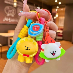 Cute cartoon puppy keychain with colorful braided lanyard and soft PVC pendant accessory