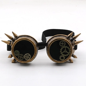 Macro view of bronze steampunk goggles with gold spikes and gear details