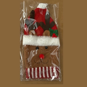 Detail of Christmas reindeer wine bottle cover featuring knitted red hat and brown antlers