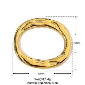 Macro view of a 17mm gold stainless steel irregular oval pendant with measurement specs