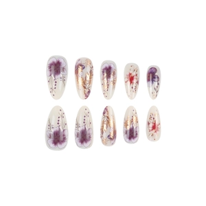 Floral almond fake nails with purple flowers and gold foil accents in a 10pcs set