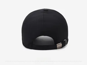 Rear view of black cotton baseball cap showing adjustable antique bronze metal buckle
