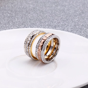 Rose gold and silver stainless steel stacked rings set with sparkling rhinestones
