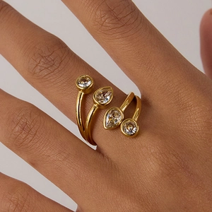 Multi-layer gold stainless steel ring with zircons worn on a model hand