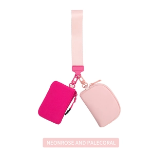 Dual nylon wristlet set featuring a neon rose pouch and pale coral coin purse details
