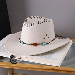Detail of light beige western hat with turquoise beads and braided decorative cord