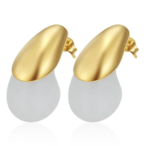 Close-up of modern teardrop earrings with golden steel and frosted white resin.
