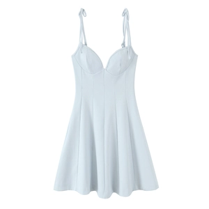Detail view of light blue floral poplin dress with adjustable tie-up shoulder straps