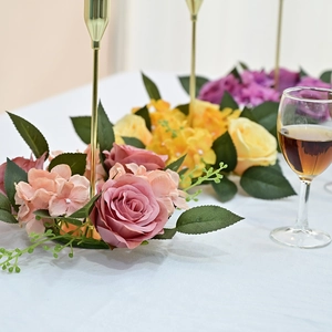 Detailed close-up of 20cm artificial pink rose and hydrangea candle ring for table decor