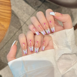 Long coffin gradient press-on nails with blue French tips and geometric white line art