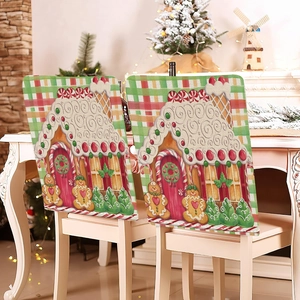 Christmas chair covers featuring cartoon gingerbread house designs for dining room decor