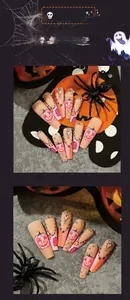 Vue macro des ongles cercueil d'Halloween avec motif citrouille rose et strass