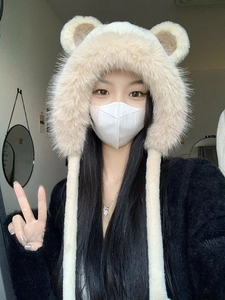 Close-up of cute bear ear plush hat featuring thick faux fur and ear protection design