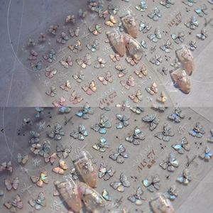 Macro detail of laser butterfly nail stickers MS571 with shiny holographic star patterns