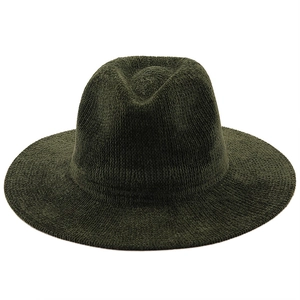 Detail showing the deep green chenille knit texture and wide brim of the vintage jazz hat