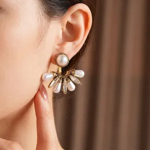 Retro fan-shaped pearl earrings featuring gold metal and sparkling zircon accents