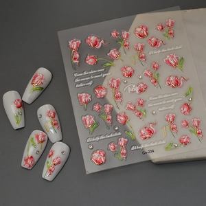 Pink tulip nail art stickers with gold foil details and 3D relief on white nail tips
