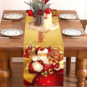 Festive gold and red Christmas table runner with Santa Claus and snowflake motifs