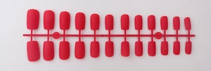Set of 24 matte red long square press-on nails displayed on a plastic frame runner