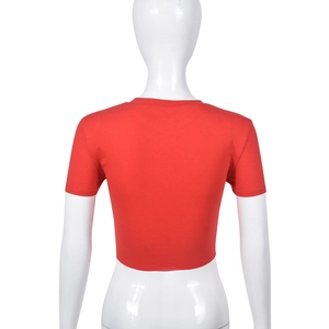 Detail view of red slim fit crop top T-shirt showing knit texture on back of mannequin