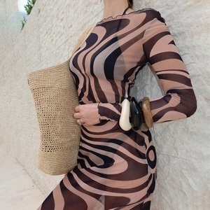 Women's chic printed long sleeve maxi dress with contrast pattern and cinched waistline