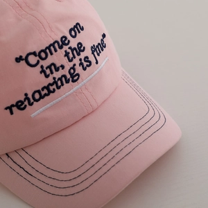 Pink kids baseball cap with navy blue embroidery and breathable fabric for summer sun protection