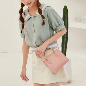 Pink faux leather crocodile textured small tote bag with detachable shoulder strap for women