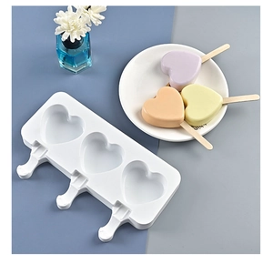Three-cavity heart shaped silicone popsicle mold with finished colorful ice cream pops