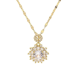 Luxury gold sunflower necklace with sparkling zircon crystals on white background