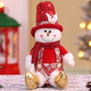Close-up of a Christmas snowman plush doll featuring red sequins and a plaid scarf