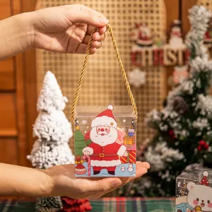 Portable Christmas transparent gift box with Santa Claus prints and golden handle