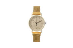 Close-up of champagne gold mesh band watch with numeric dial and spade logo detail