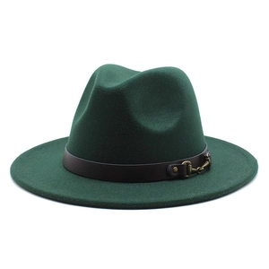 Detail of dark green fedora hat with black leather band and gold horsebit buckle