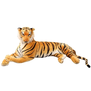 Realistic striped tiger plush toy in a lying position, high-quality decorative doll