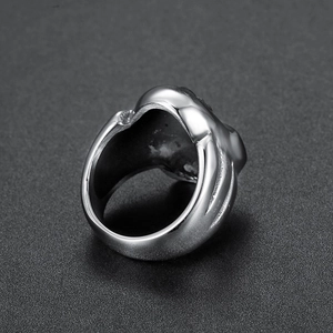 Gothic skull ring in polished stainless steel with detailed carvings, 45-degree angle