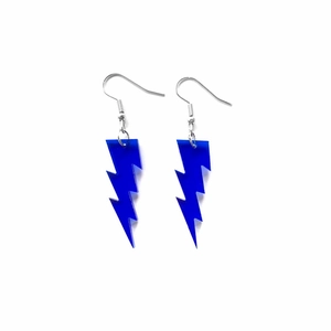 Blue glitter acrylic lightning bolt drop earrings with silver metal hooks on white background