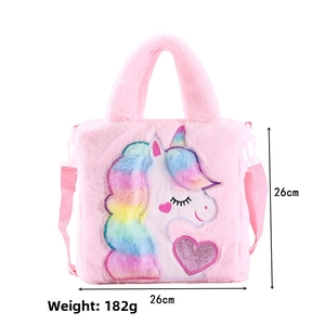 Detailed size view of pink plush unicorn handbag measuring 26cm with rainbow embroidery