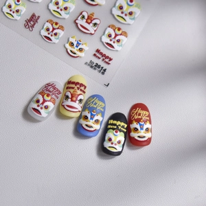 Detail of 3D embossed nail stickers featuring lion dance designs and happy new year text