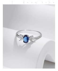 Detailed close-up of S925 silver ring featuring blue sapphire and marquise zircon stones