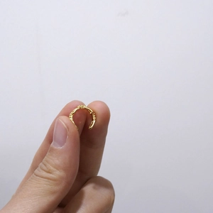 Gold-plated C-shaped ear cuff featuring a vintage twisted braid texture for women