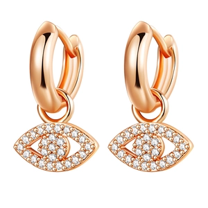 Rose gold Evil Eye hoop earrings with white zircon stones on a white background