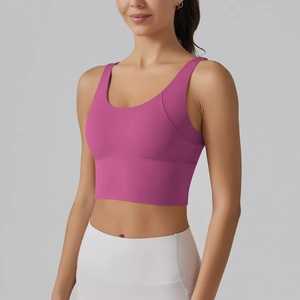Close-up of wide hem on dark rose red yoga bra for enhanced athletic support and fit