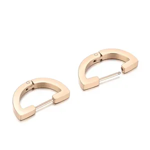 Boucles d'oreilles géométriques en forme de U couleur or rose avec fermoir charnière