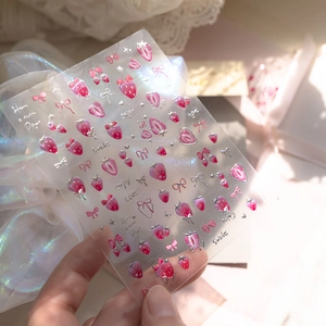 Pink strawberry and bow DIY nail art stickers on transparent background with sweet motifs