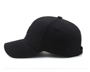 Side view of black cotton baseball cap showing reinforced stitching and breathable vents