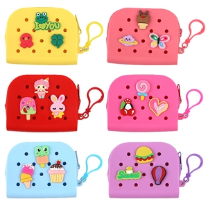 Collection of six colorful silicone mini purses with cartoon charms and hanging clips